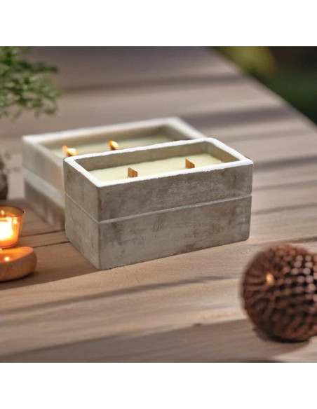 Vela de ciment amb metxa de fusta