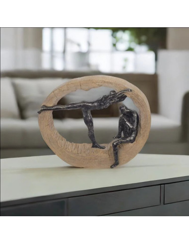 Figura home i dona en roca