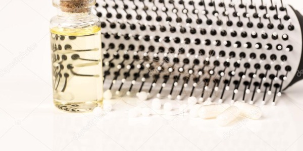 LOS MEJORES ACEITES ESENCIALES PARA FRENAR  LA CAÍDA DEL CABELLO